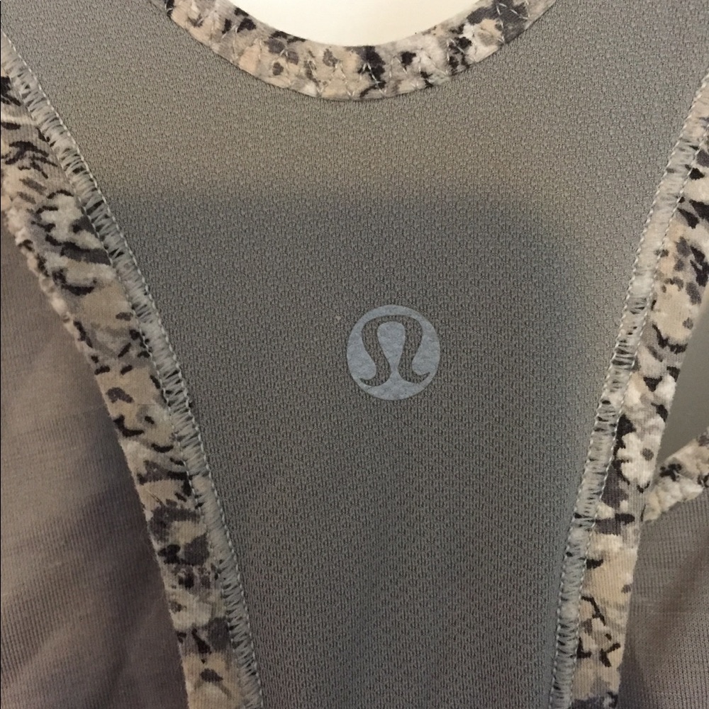 Authentic Lululemon workout top, cool cutout back!